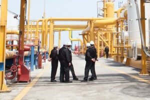 Engineers walking around industrial facility