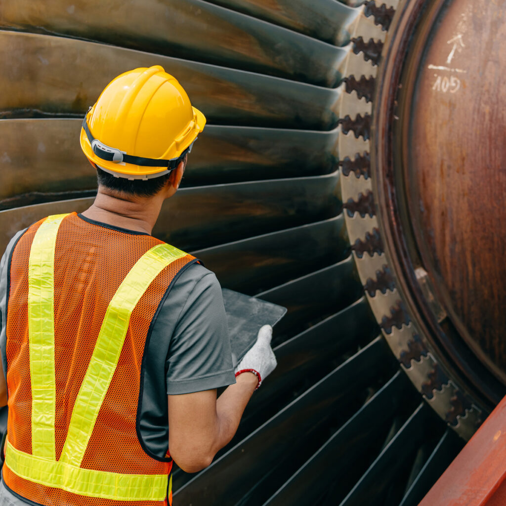 Armstrong International Engineer at coal power facility checks equipment for thermal efficiency